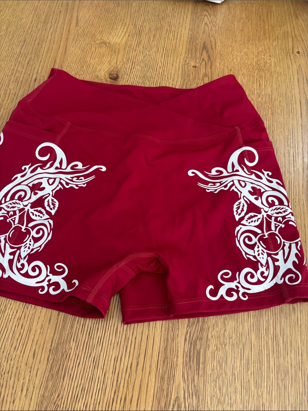 Women’s Red Athletic Shorts with White Scroll Print